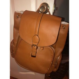 Brown leather backpack